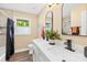 Well-lit bathroom with double vanity, modern fixtures, and a tub/shower combo provides comfort and convenience at 504 Katherine Ave, Kings Mountain, NC 28086