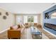 Inviting living room featuring a modern fireplace, hardwood floors, and neutral color scheme at 504 Katherine Ave, Kings Mountain, NC 28086
