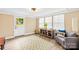 Bright sun room features natural light, hardwood style floors, and modern furniture at 504 Katherine Ave, Kings Mountain, NC 28086