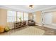 Comfortable sun room with natural light, tile floor, and modern furniture at 504 Katherine Ave, Kings Mountain, NC 28086