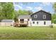 This home has a shed and a spacious backyard, with deck and stairs to the house at 5316 Teakwood Dr, Kannapolis, NC 28083