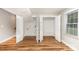 This finished basement features wood grain floors and multiple closets for storage at 5316 Teakwood Dr, Kannapolis, NC 28083