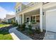 Charming home exterior with inviting front porch, columns, and a pathway leading to the entrance at 7116 Brookline Pl, Huntersville, NC 28078