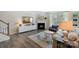Comfortable living room with a fireplace, large window, and modern decor, creating a relaxing atmosphere at 7116 Brookline Pl, Huntersville, NC 28078