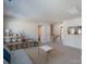 Upper-level playroom with space for playing or relaxing with shelves and television at 7116 Brookline Pl, Huntersville, NC 28078