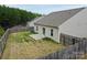Image of the backyard featuring a wood fence and small concrete patio at 8606 Highgate Dr, Charlotte, NC 28215