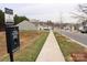 Neighborhood featuring a pet waste station along the sidewalk at 8606 Highgate Dr, Charlotte, NC 28215