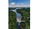 Stunning waterfront property with mature trees and direct access to the serene lake at 8915 Linden Grove Ct, Sherrills Ford, NC 28673