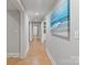 Bright hallway with tiled floors, recessed lighting, and neutral walls at 8915 Linden Grove Ct, Sherrills Ford, NC 28673