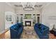 Elegant living room with coffered ceilings, fireplace, and access to the backyard at 8915 Linden Grove Ct, Sherrills Ford, NC 28673