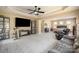 Spacious main bedroom with tray ceilings, sitting area, workout space, and access to the main bathroom at 9422 Ridgeforest Dr, Charlotte, NC 28277