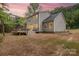 Beautiful two-story home featuring a spacious deck, perfect for outdoor living and enjoying the surrounding scenery at 9849 Rich Hatchet Rd, Huntersville, NC 28078