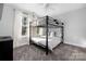 Charming ' bedroom with cozy bunk beds, soft carpeting and bright natural light at 9849 Rich Hatchet Rd, Huntersville, NC 28078