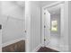 Spacious walk-in closet with adjustable shelving and new carpeting provides ample storage at 9849 Rich Hatchet Rd, Huntersville, NC 28078