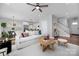 Open-concept living room flows into a modern kitchen and dining area, creating an ideal space for gatherings at 9849 Rich Hatchet Rd, Huntersville, NC 28078