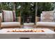 Inviting outdoor space with a modern fire pit and comfortable seating, perfect for enjoying drinks outdoors at 9849 Rich Hatchet Rd, Huntersville, NC 28078