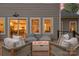 Relaxing outdoor patio featuring comfortable seating and a cozy fire pit for enjoyable evenings at 9849 Rich Hatchet Rd, Huntersville, NC 28078