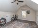 Bonus room with a window, ceiling fan, and ample space suitable for multiple uses and hobbies at 1009 Summer Creste Dr, Indian Trail, NC 28079
