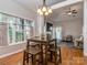 Cozy dining area with hardwood floors, lots of natural light and open layout to the living area at 1009 Summer Creste Dr, Indian Trail, NC 28079
