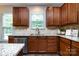 Kitchen counter features stainless appliances and granite countertops at 10125 Loch Lomond Dr, Charlotte, NC 28278