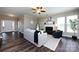 Cozy living room with a fireplace, neutral walls, and lots of natural light at 10125 Loch Lomond Dr, Charlotte, NC 28278