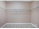 Spacious walk-in closet includes wrap-around shelving for maximum storage at 10125 Loch Lomond Dr, Charlotte, NC 28278