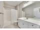 Bathroom with a tub and shower combo with a shower curtain, a single sink, and a large mirror at 111 Sterling Dr, York, SC 29745