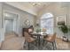 Elegant dining room with a round table, arched window, stylish decor, and a cozy ambiance at 111 Sterling Dr, York, SC 29745