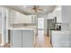 Bright kitchen featuring white cabinets, stainless steel appliances, and a functional open layout at 111 Sterling Dr, York, SC 29745
