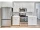 Modern kitchen appliances including stainless steel refrigerator, oven, and microwave at 111 Sterling Dr, York, SC 29745