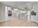 Open-concept kitchen flowing into the living area, featuring modern appliances and a seamless design at 111 Sterling Dr, York, SC 29745