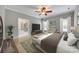 Serene main bedroom with hardwood floors, neutral tones, and an en-suite bathroom at 111 Sterling Dr, York, SC 29745
