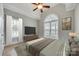 Bright main bedroom with a trey ceiling, a large window, neutral paint, and hardwood floors at 111 Sterling Dr, York, SC 29745