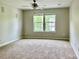 Bedroom featuring natural light from double windows and neutral colored walls at 12815 Towering Pine Dr, Charlotte, NC 28269