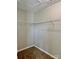 Walk-in closet with carpet flooring and installed shelving to keep you organized at 12815 Towering Pine Dr, Charlotte, NC 28269