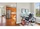 Home office next to a modern kitchen featuring a modern desk with a comfortable chair at 176 Sunset Bay Dr, Troutman, NC 28166