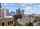 Great city view of uptown Charlotte, featuring buildings, trees and partly cloudy skies at 210 N Church St # 2305, Charlotte, NC 28202