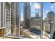 Expansive windows capture the impressive cityscape views from this condo at 210 N Church St # 2305, Charlotte, NC 28202