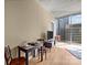 Cozy dining area with a city view, a small table set, and a television at 210 N Church St # 2305, Charlotte, NC 28202