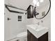 Modern bathroom with a sleek vanity, contemporary fixtures, and a glass-enclosed shower at 2314 Wolfe St, Charlotte, NC 28205