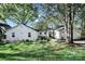 Charming single-story home featuring well-maintained landscaping and mature trees in a desirable neighborhood at 2314 Wolfe St, Charlotte, NC 28205
