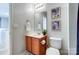Cozy bathroom with wood vanity, framed mirror, and stylish decor for a modern look at 309 River Clay Rd, Fort Mill, SC 29708