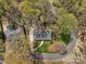 Aerial view of a home, showcasing its landscaping and mature trees at 3524 Johnny Cake Ln, Charlotte, NC 28226