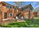 Charming backyard featuring a brick patio and lush lawn with access to the home at 3524 Johnny Cake Ln, Charlotte, NC 28226