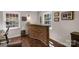 A bar area with a custom brick counter, sink, wine rack, and two windows at 3524 Johnny Cake Ln, Charlotte, NC 28226