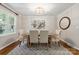 Elegant dining room with modern lighting and stylish decor at 3524 Johnny Cake Ln, Charlotte, NC 28226