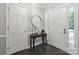 Charming entryway with slate floors, console table, and white doors at 3524 Johnny Cake Ln, Charlotte, NC 28226