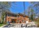 Brick two-story home with a screened porch and convenient garage access at 3524 Johnny Cake Ln, Charlotte, NC 28226