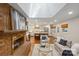 Open concept living room with brick fireplace and skylight at 3524 Johnny Cake Ln, Charlotte, NC 28226