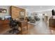 Comfortable Living Room with cozy seating, fireplace, and hardwood flooring at 3524 Johnny Cake Ln, Charlotte, NC 28226